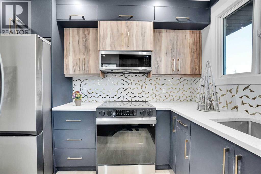 12112 Canfield Road Sw, Calgary, Alberta  T2W 1V2 - Photo 9 - A2295382