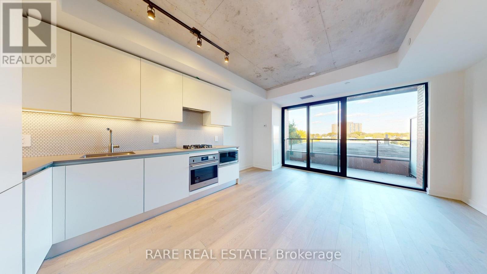 317 - 2720 Dundas Street W, Toronto, Ontario  M6P 0C3 - Photo 2 - W12695222