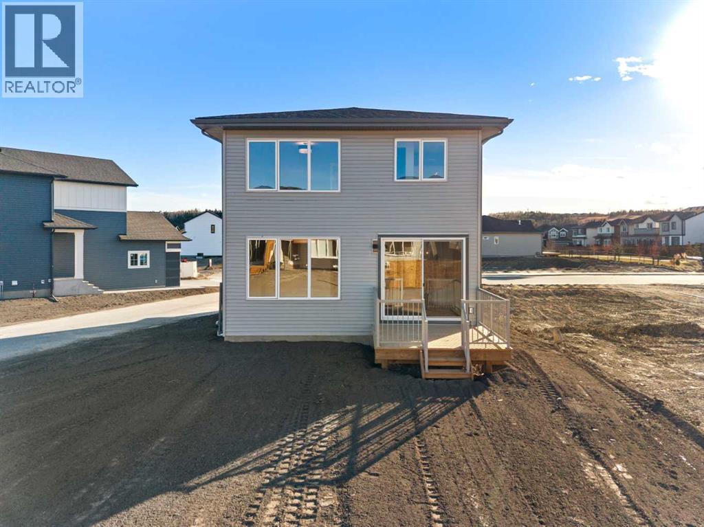 85 Quartz Crescent, Cochrane, Alberta  T4C 3G2 - Photo 36 - A2282373