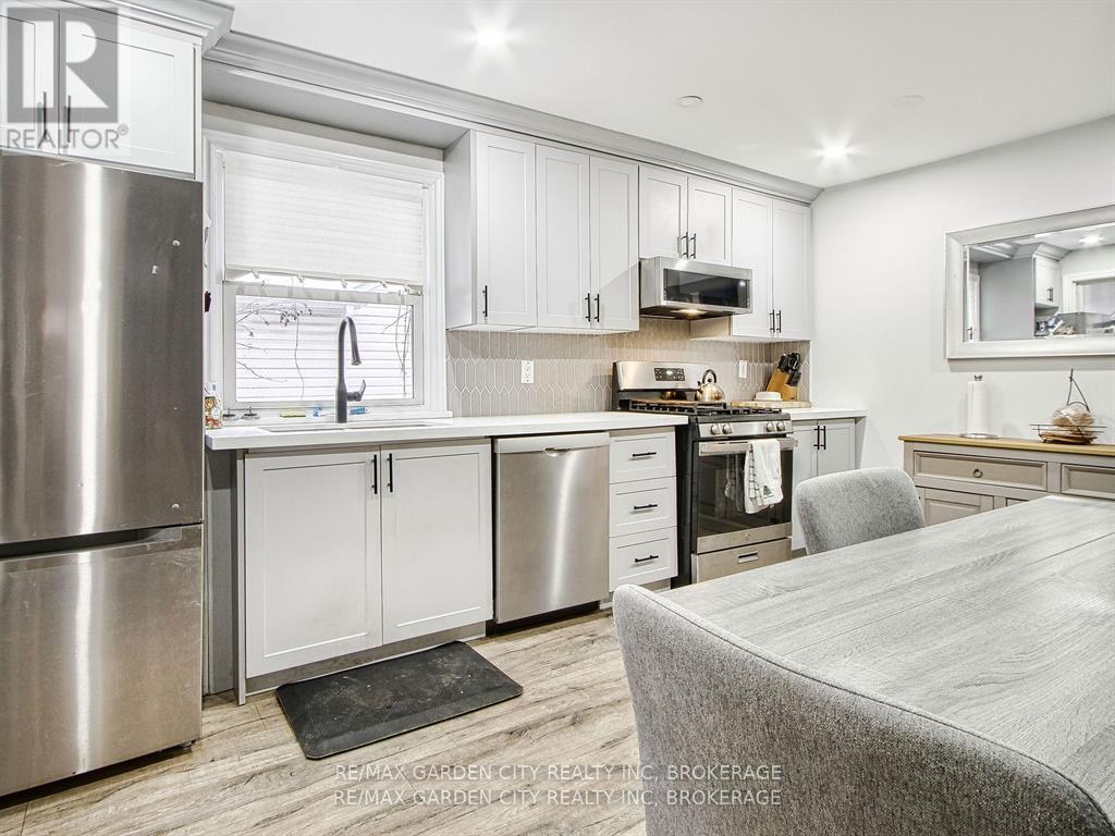 68 Carlton Street, St. Catharines, Ontario  L2R 1P8 - Photo 8 - X12911512