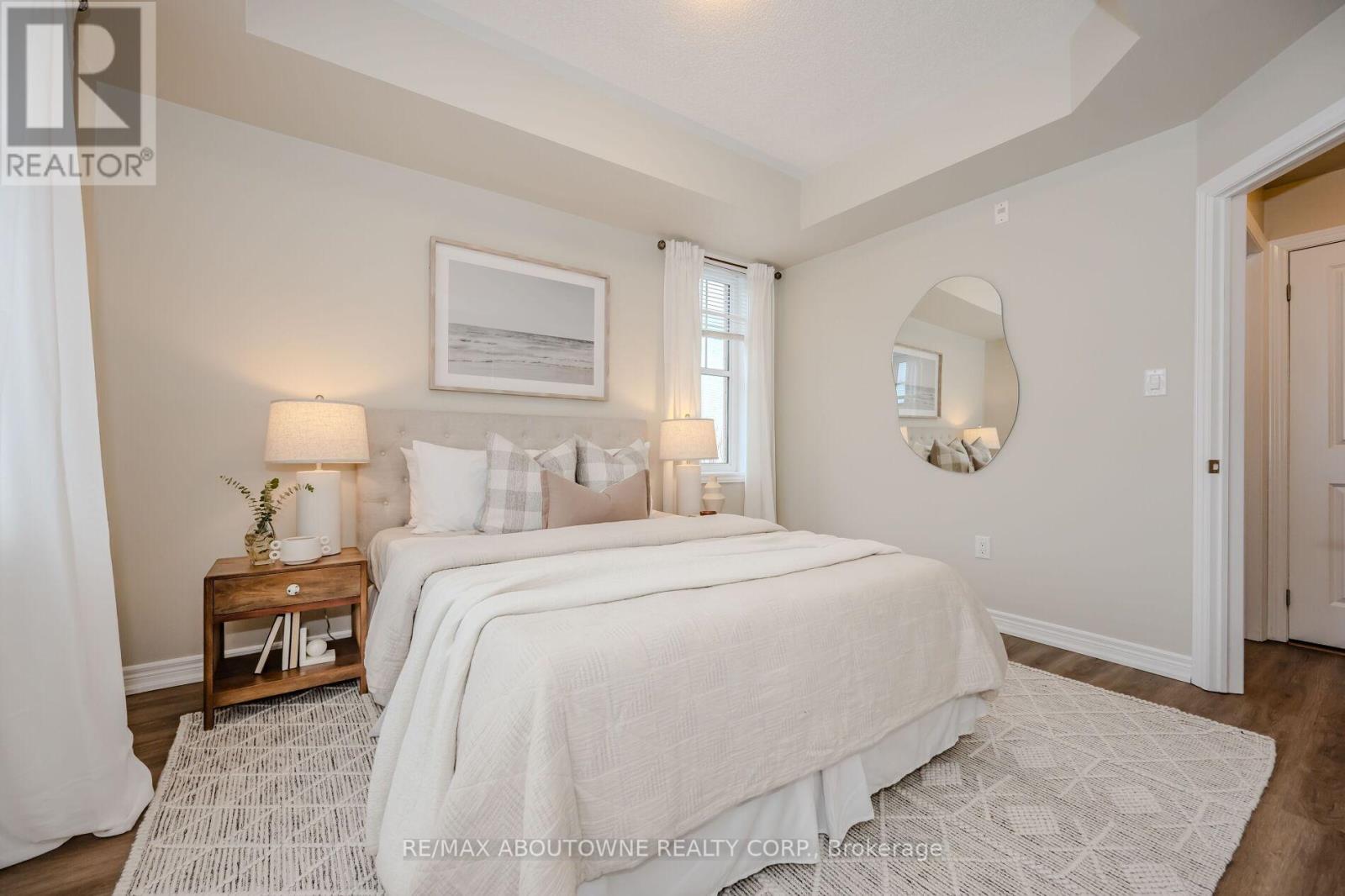 312 - 269 Georgian Drive, Oakville, Ontario  L6H 0L1 - Photo 18 - W12911662