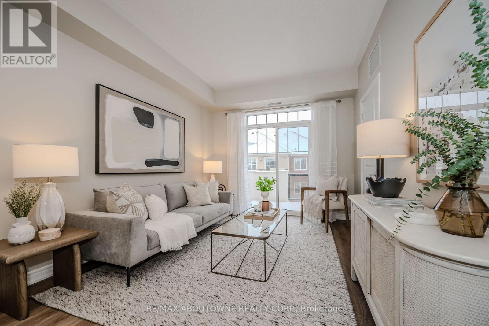 312 - 269 Georgian Drive, Oakville, Ontario  L6H 0L1 - Photo 8 - W12911662