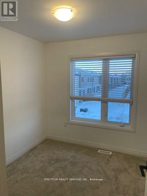 129 Gateland Drive, Barrie (Painswick South), Ontario  L9J 0N1 - Photo 9 - S12911944