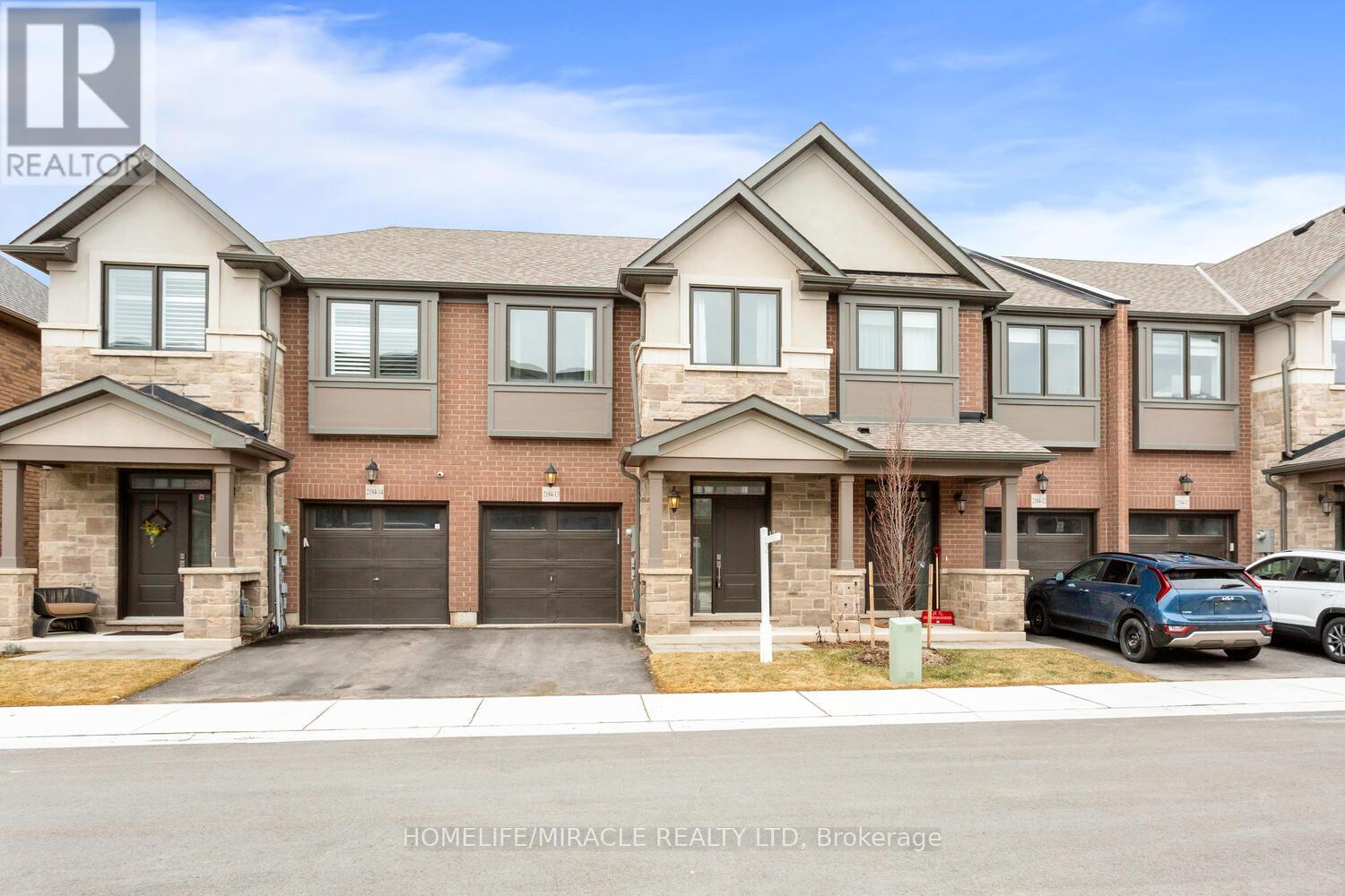 13 - 2184 Postmaster Drive, Oakville, Ontario  L6M 3X1 - Photo 2 - W12911982