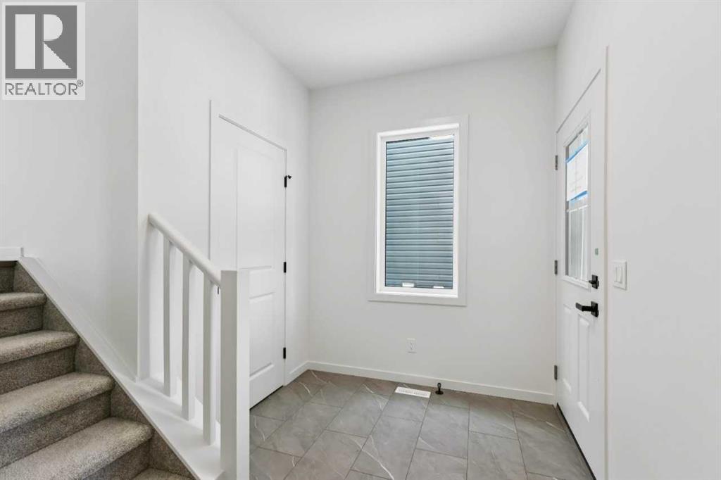 823 Bayview Terrace Sw, Airdrie, Alberta  T4B 4G2 - Photo 4 - A2295583