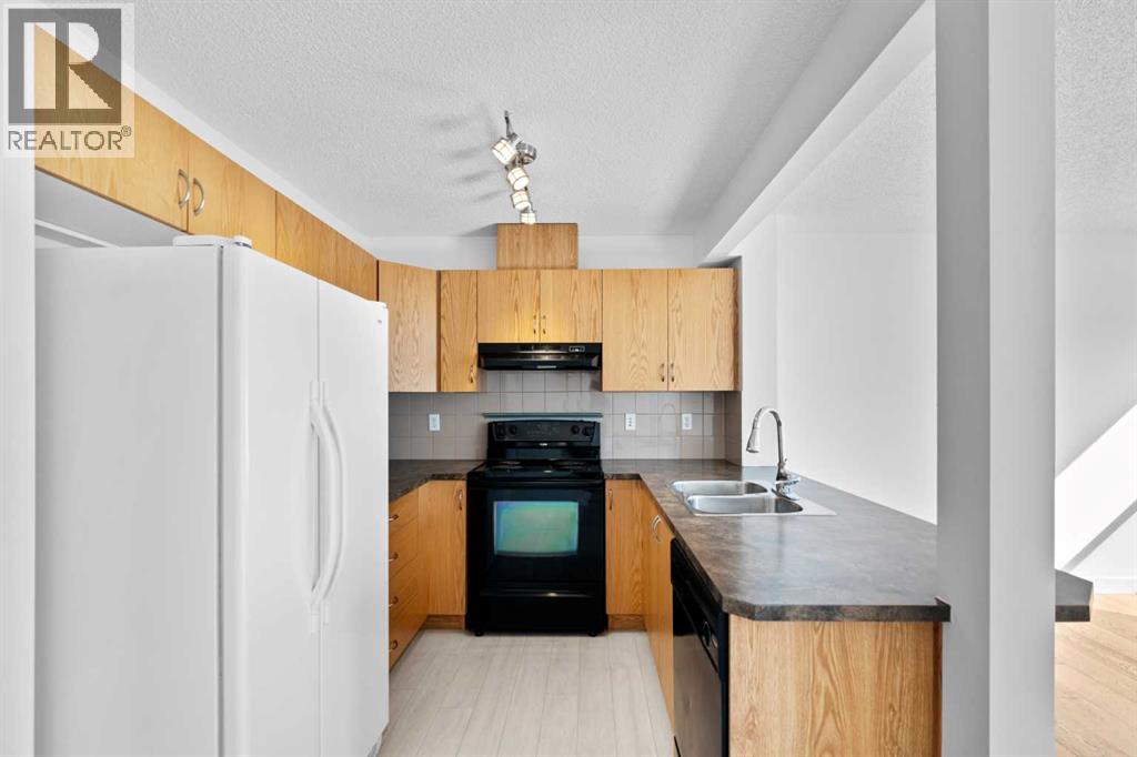 85 Panatella Villas Nw, Calgary, Alberta  T3K 0G6 - Photo 8 - A2288605