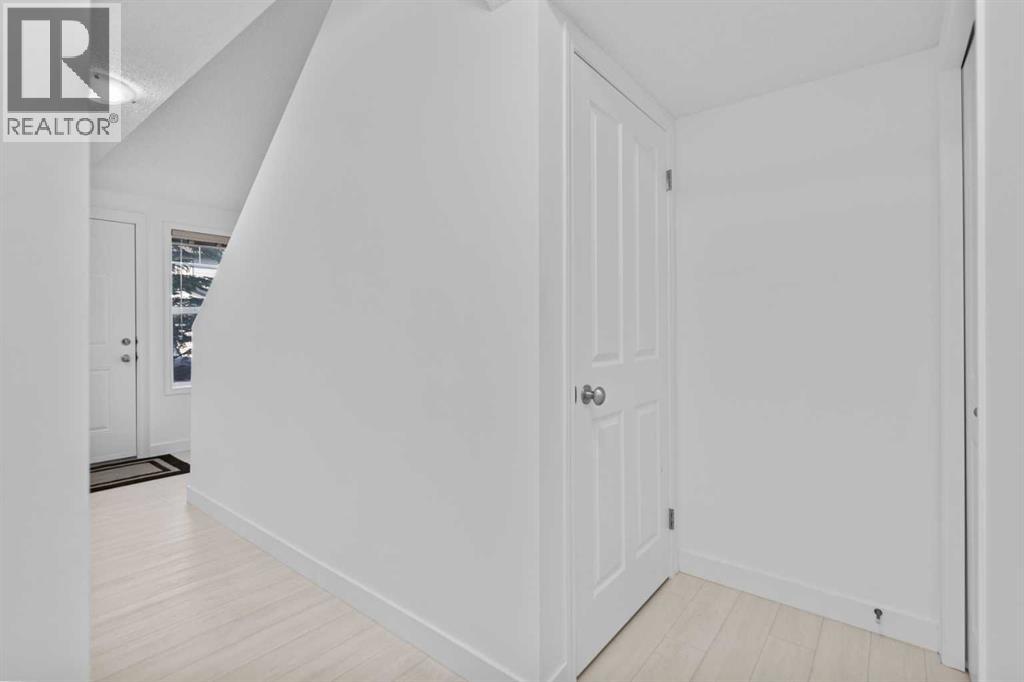 85 Panatella Villas Nw, Calgary, Alberta  T3K 0G6 - Photo 4 - A2288605