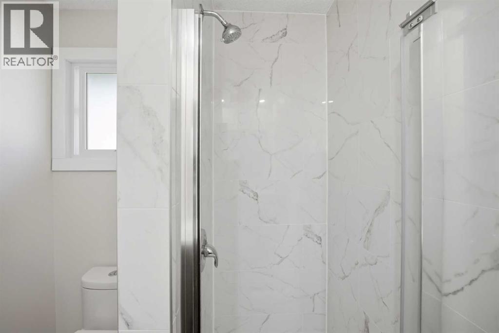 107 Wood Oak Way Sw, Calgary, Alberta  T2W 3R3 - Photo 32 - A2295026