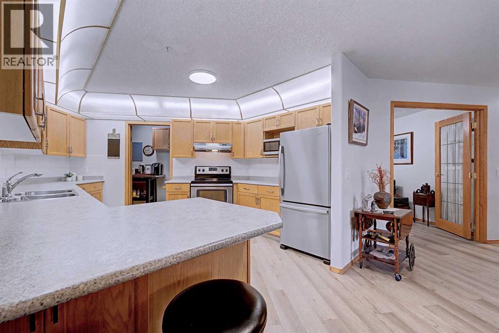 106, 7239 Sierra Morena Boulevard Sw, Calgary, Alberta  T3H 3L7 - Photo 11 - A2294408