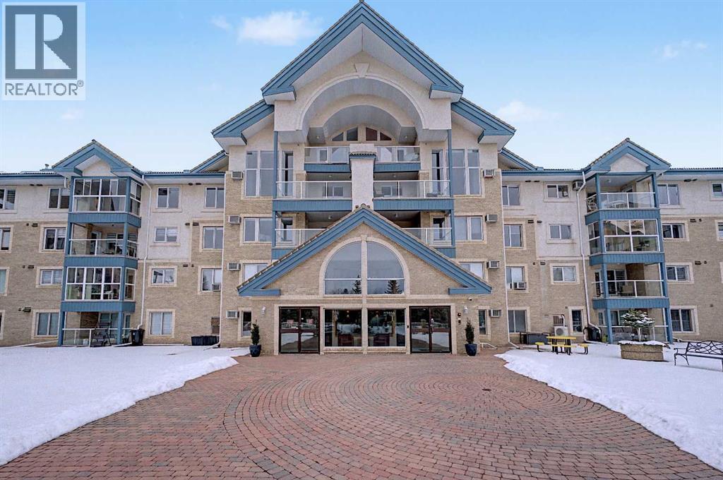 106, 7239 Sierra Morena Boulevard Sw, Calgary, Alberta  T3H 3L7 - Photo 1 - A2294408