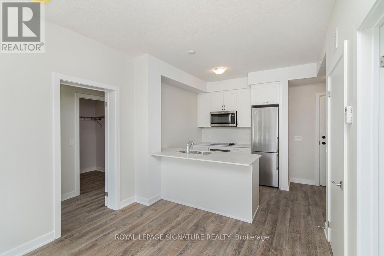 104 - 600 North Service Road, Hamilton (Lakeshore), Ontario  L8E 5A7 - Photo 2 - X12912432