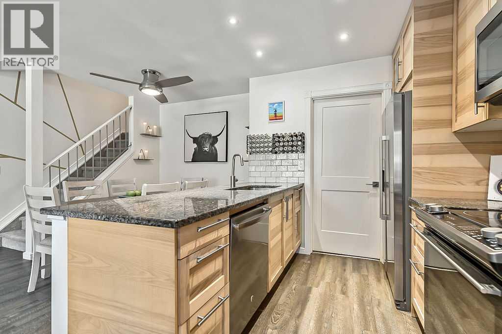 4, 207 Grier Terrace NE, Calgary, Alberta  T2K 5Y7 - Photo 8 - A2292905