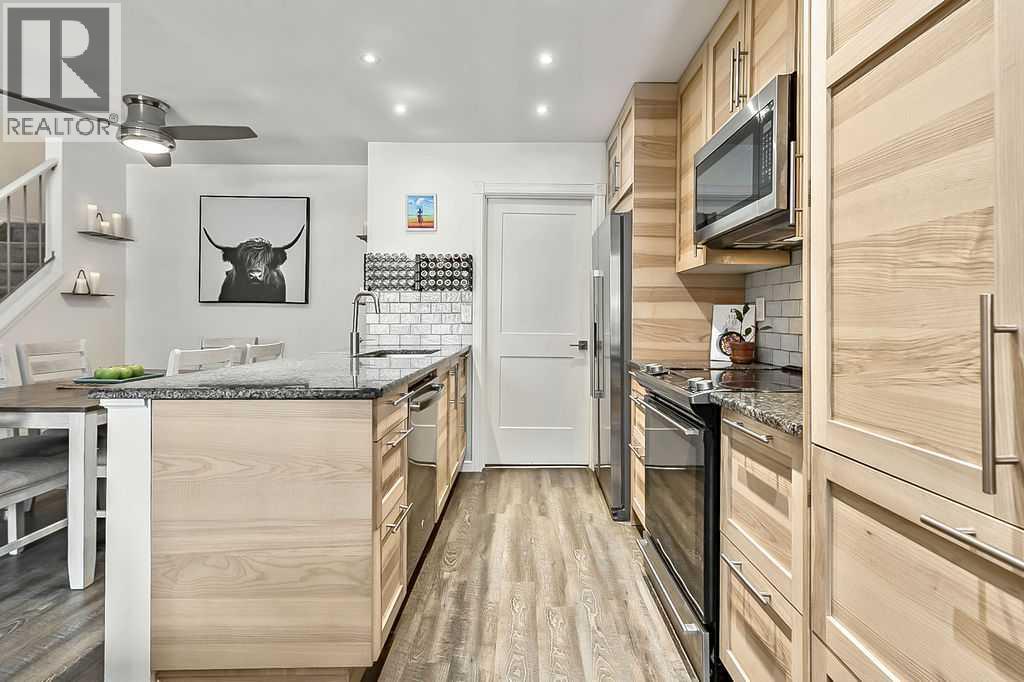 4, 207 Grier Terrace NE, Calgary, Alberta  T2K 5Y7 - Photo 7 - A2292905