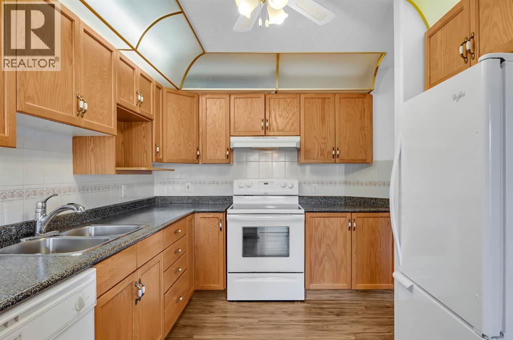 311, 7239 Sierra Morena Boulevard Sw, Calgary, Alberta  T3H 3L7 - Photo 5 - A2280711