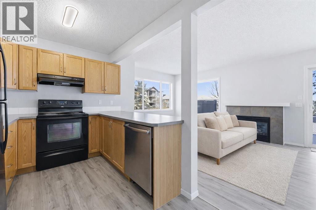 52 Panatella Villas NW, Calgary, Alberta  T3K 0G6 - Photo 5 - A2293833