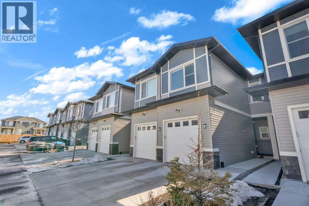 103, 116 Saddlestone Heath NE, Calgary, Alberta  T3J 5K8 - Photo 2 - A2294538