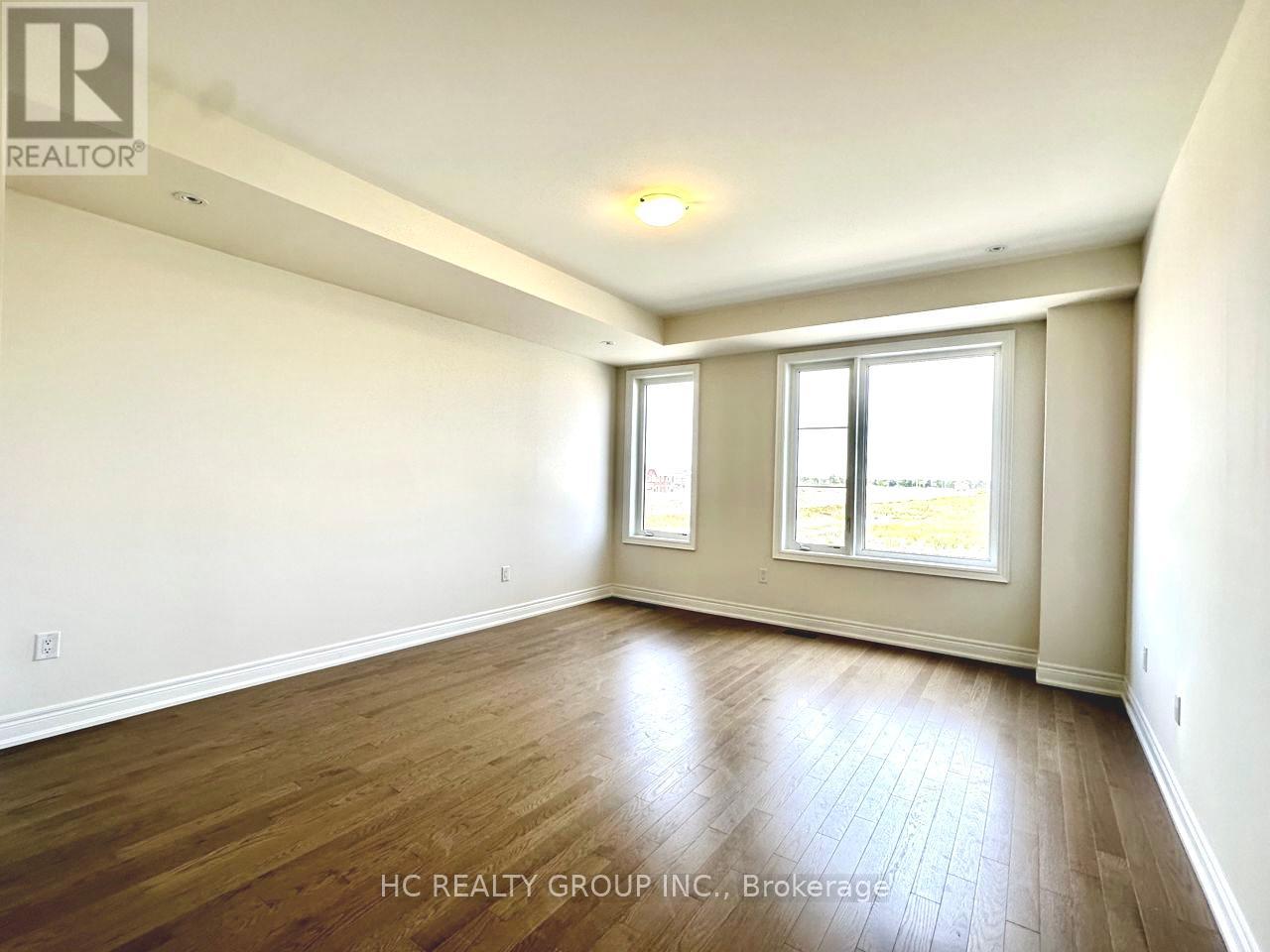 561 Vine Cliff Boulevard, Markham, Ontario  L6C 3N4 - Photo 5 - N12912774