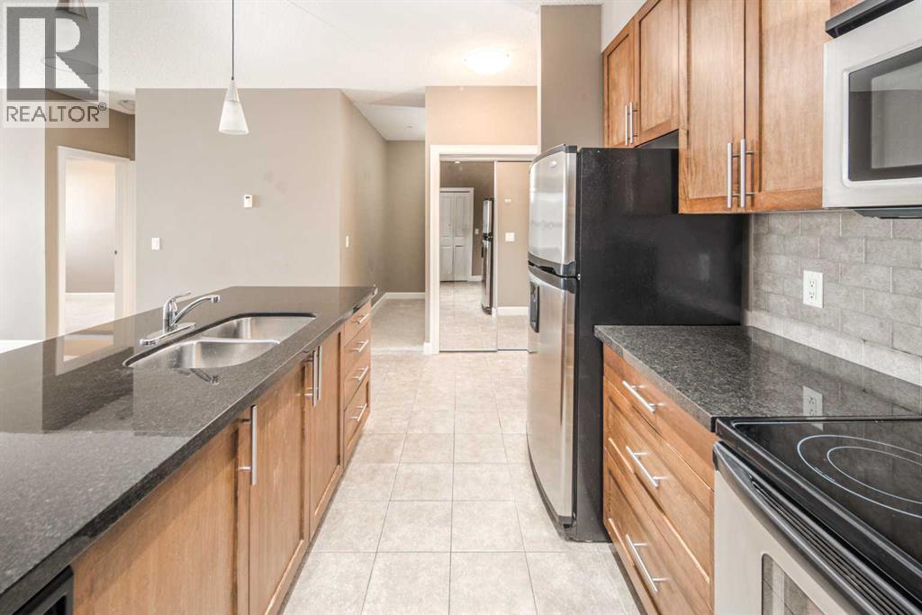 203, 88 Arbour Lake Road Nw, Calgary, Alberta  T3G 0C2 - Photo 12 - A2295878