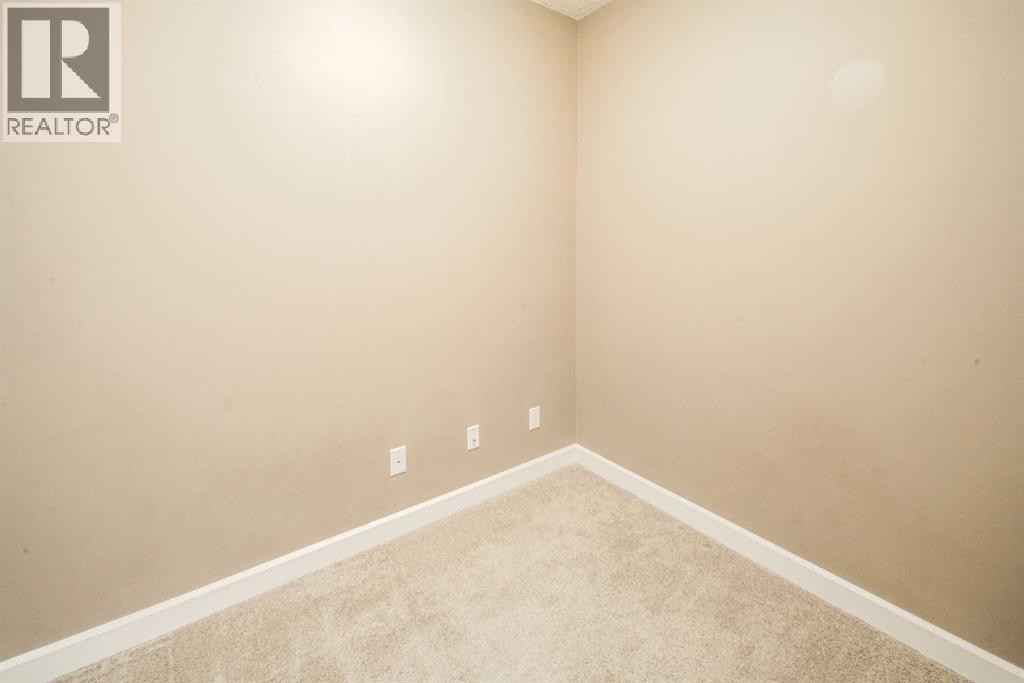 203, 88 Arbour Lake Road Nw, Calgary, Alberta  T3G 0C2 - Photo 9 - A2295878