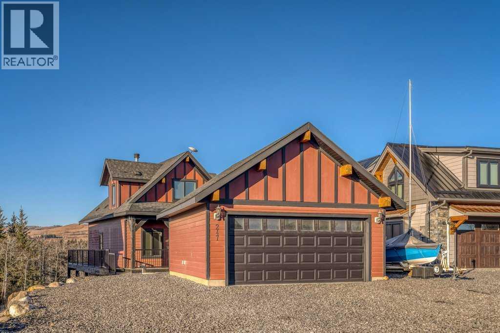 247 Cottageclub Crescent, Rural Rocky View County, Alberta  T4C 1B1 - Photo 3 - A2271474