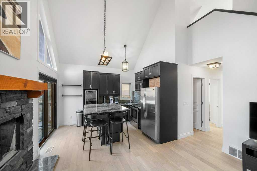 247 Cottageclub Crescent, Rural Rocky View County, Alberta  T4C 1B1 - Photo 8 - A2271474