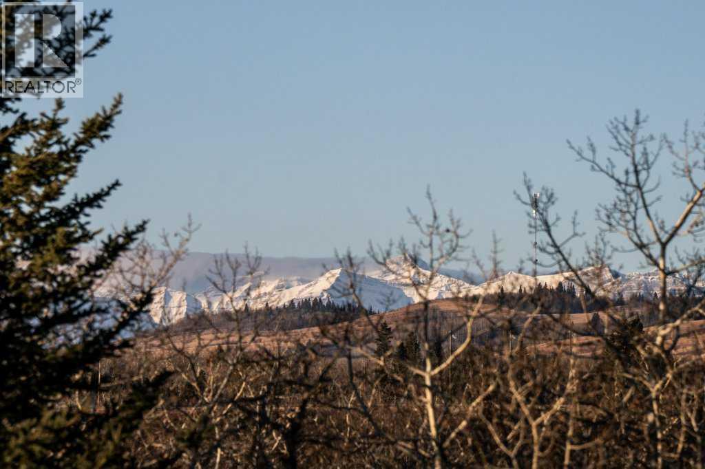 247 Cottageclub Crescent, Rural Rocky View County, Alberta  T4C 1B1 - Photo 21 - A2271474