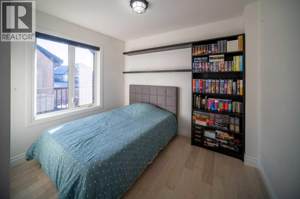 247 Cottageclub Crescent, Rural Rocky View County, Alberta  T4C 1B1 - Photo 24 - A2271474