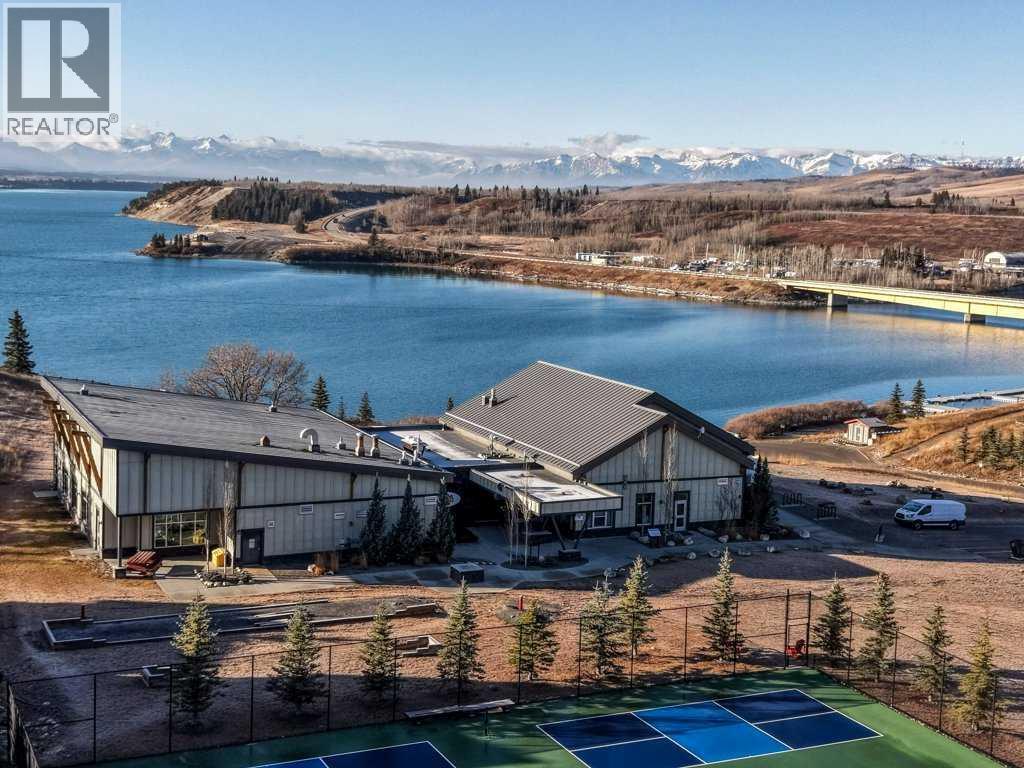 247 Cottageclub Crescent, Rural Rocky View County, Alberta  T4C 1B1 - Photo 34 - A2271474