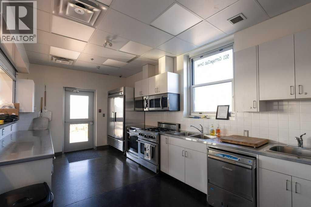 247 Cottageclub Crescent, Rural Rocky View County, Alberta  T4C 1B1 - Photo 46 - A2271474