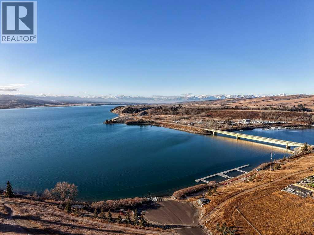 247 Cottageclub Crescent, Rural Rocky View County, Alberta  T4C 1B1 - Photo 36 - A2271474