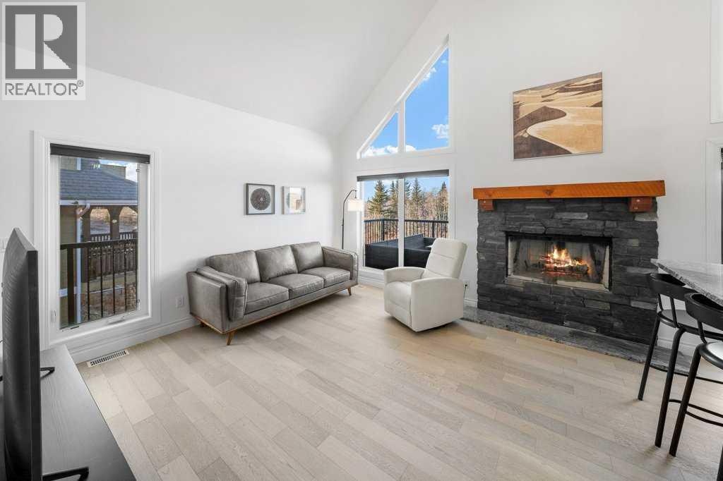 247 Cottageclub Crescent, Rural Rocky View County, Alberta  T4C 1B1 - Photo 12 - A2271474