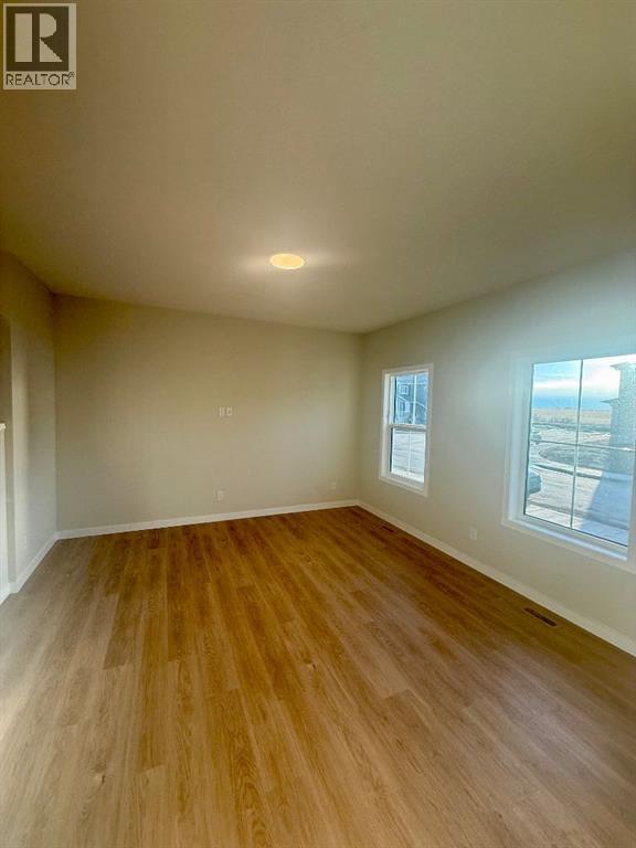 341 Ellen Park, Crossfield, Alberta  T0M 0S0 - Photo 2 - A2295058