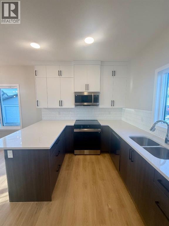 341 Ellen Park, Crossfield, Alberta  T0M 0S0 - Photo 5 - A2295058