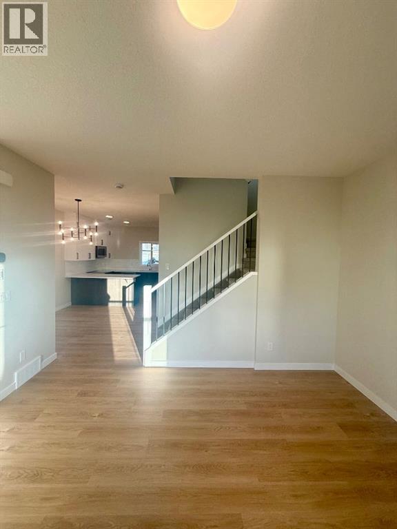 341 Ellen Park, Crossfield, Alberta  T0M 0S0 - Photo 3 - A2295058