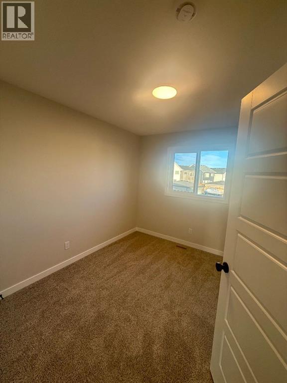 341 Ellen Park, Crossfield, Alberta  T0M 0S0 - Photo 9 - A2295058