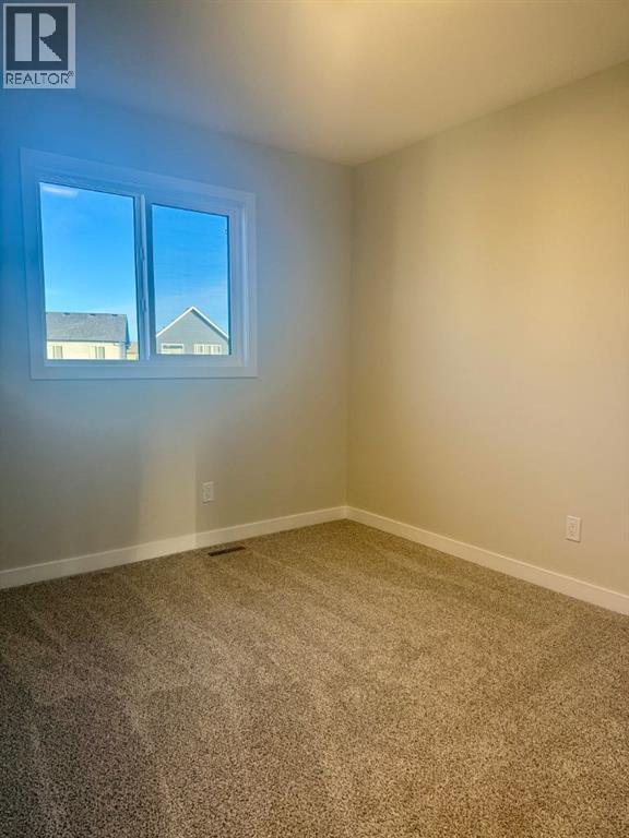 341 Ellen Park, Crossfield, Alberta  T0M 0S0 - Photo 10 - A2295058