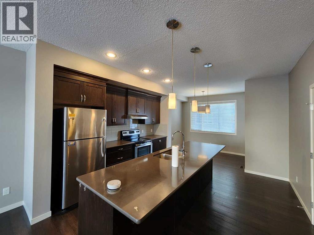 217 Panatella Walk NW, Calgary, Alberta  T3K 0Z3 - Photo 9 - A2283128