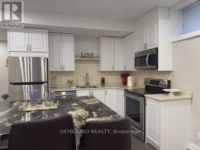 Bsmt - 48 Enfield Avenue, Toronto, Ontario  M8W 1T8 - Photo 2 - W12912970