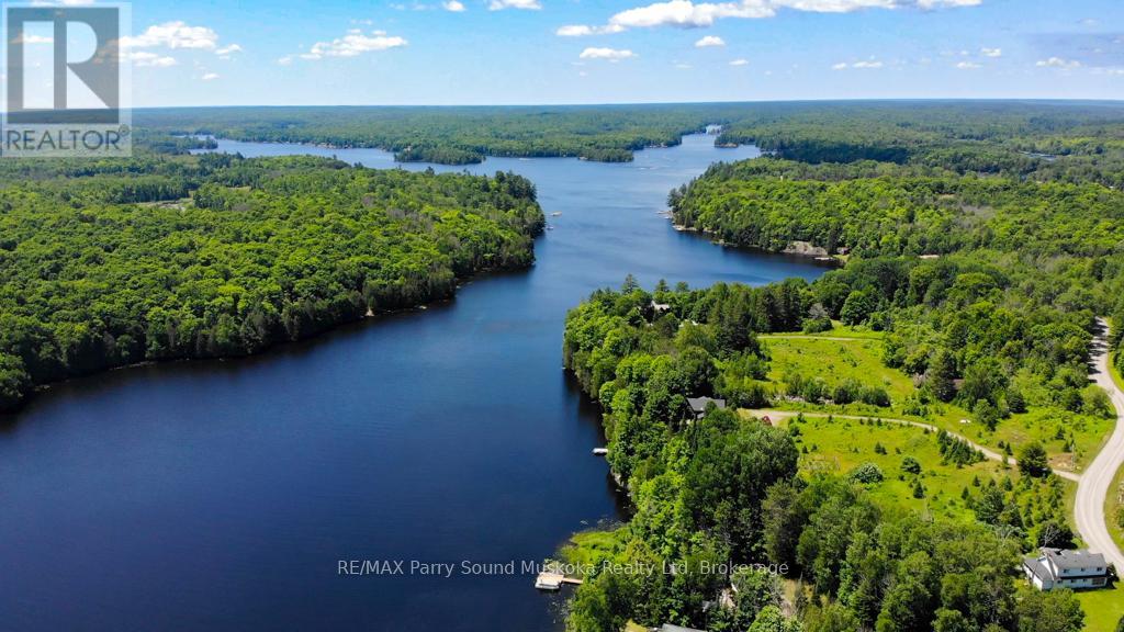 20 Golden Horseshoe Lane, Whitestone, Ontario  P0A 1G0 - Photo 1 - X12913084