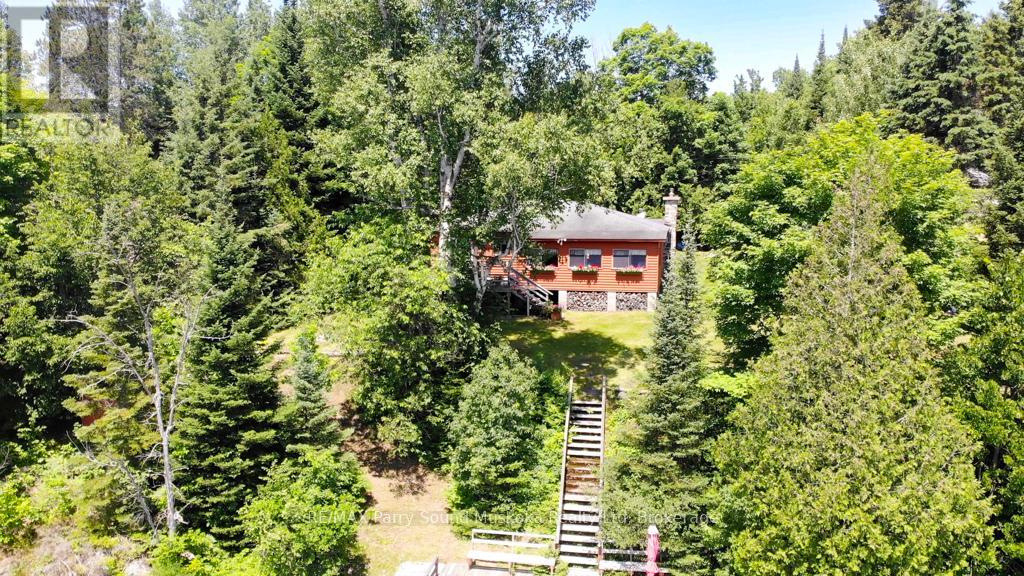 20 Golden Horseshoe Lane, Whitestone, Ontario  P0A 1G0 - Photo 4 - X12913084