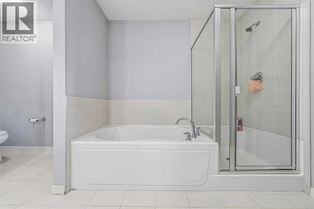 211 Fireside Drive, Cochrane, Alberta  T4C 2L4 - Photo 19 - A2295447