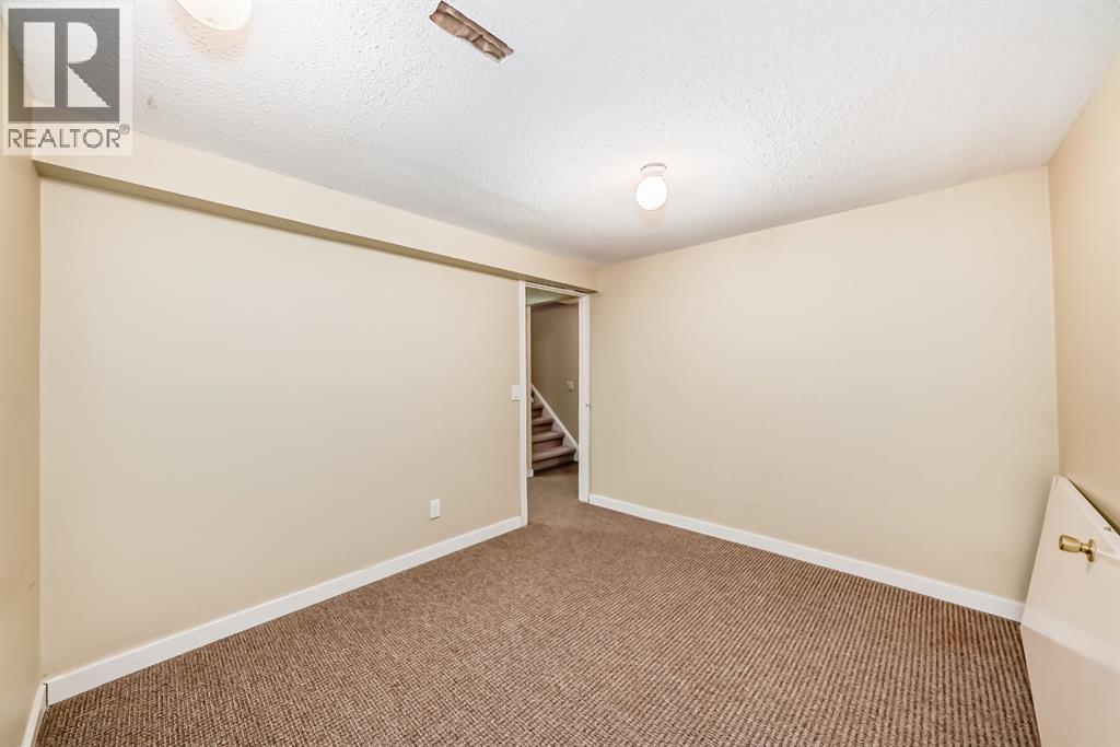 247 Bracewood Road Sw, Calgary, Alberta  T2W 3C2 - Photo 25 - A2293348