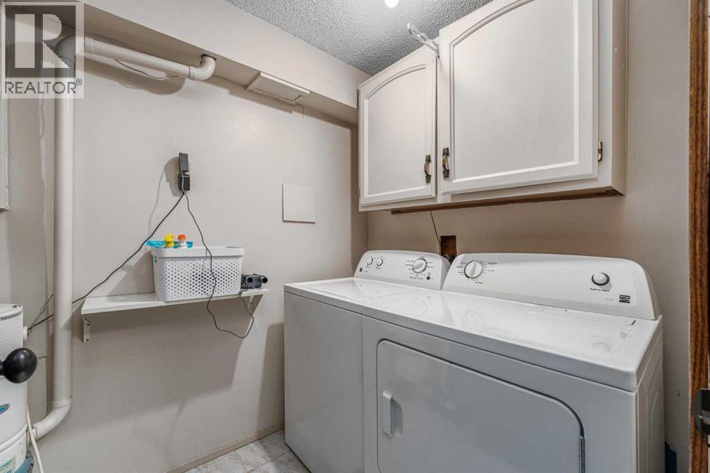 13, 828 Coach Bluff Crescent Sw, Calgary, Alberta  T3H 1A8 - Photo 37 - A2293433