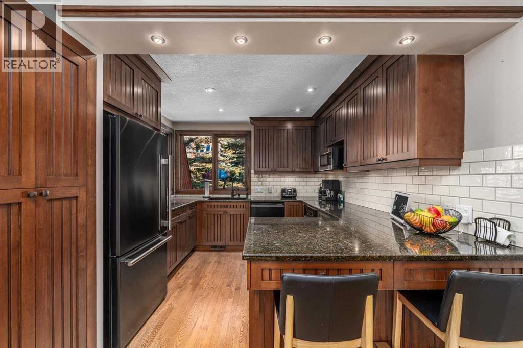 13, 828 Coach Bluff Crescent Sw, Calgary, Alberta  T3H 1A8 - Photo 15 - A2293433