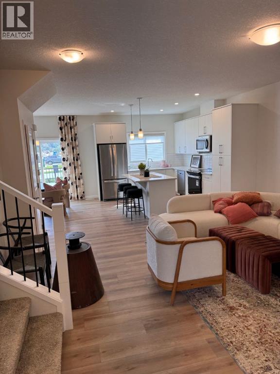 4 Wolf Hollow Road SE, Calgary, Alberta  T2X 5R8 - Photo 3 - A2250769