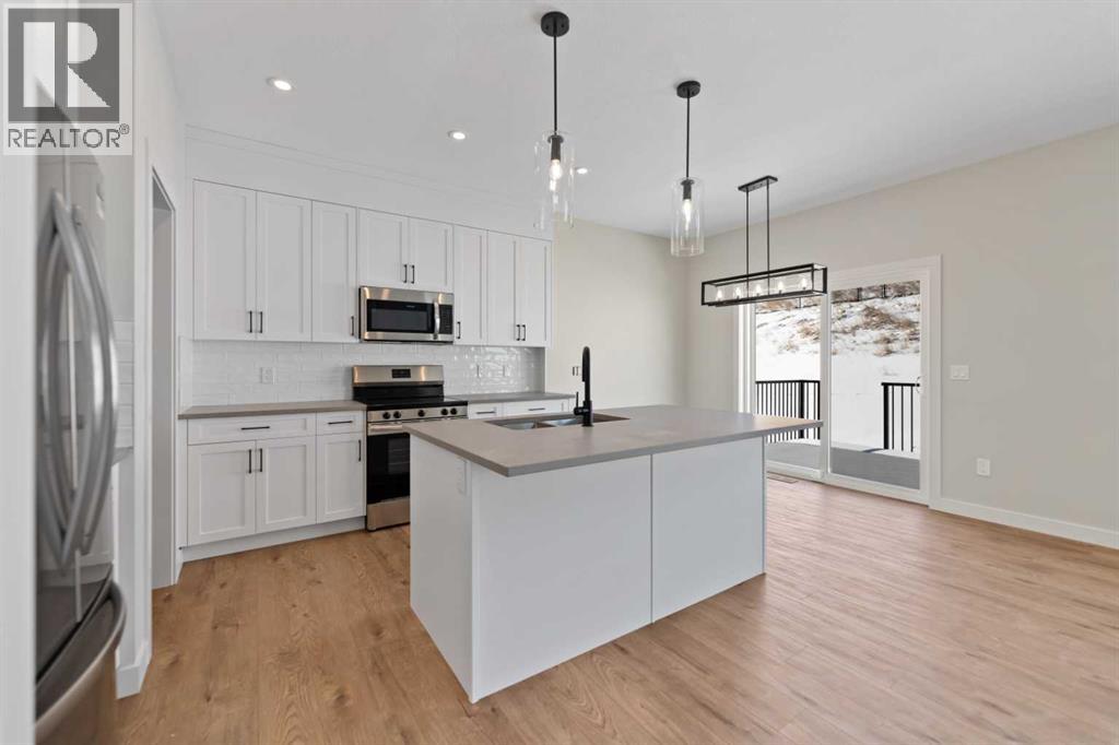 1051 Fowler Road Sw, Airdrie, Alberta  T4B 5T2 - Photo 2 - A2293504