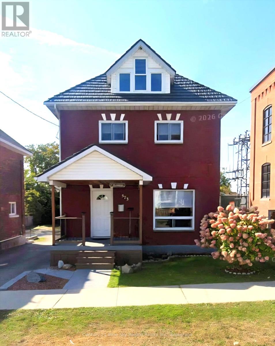 Welcome to 573 Worthington Street E - a beautifully updated century home in the heart of North Bay.  Full of character and modern comfort, this move-in-ready property showcases true pride of ownership. Major updates have already been taken care of, including a newer metal roof, updated flooring throughout, Dowdall Kitchen cabinetry, newer windows, and exterior doors - giving buyers peace of mind for years to come. Inside, there's plenty of space for a growing family. The second level offers four generous bedrooms, while the third-floor loft provides the potential for a fifth bedroom or a dream bonus space, ready for your finishing touches. Step outside to an impressive 132-foot deep, fully fenced yard - perfect for kids, pets, gardens, trampolines, or even a portable pool. It's a rare find in such a central location. From this address, you can walk to nearly everything: the Kate Pace Way, Lee Park, the beach, restaurants, the library, churches, and shopping. Whether you're a first-time buyer, investor, or simply looking for a spacious home with historic charm, this stunning century property delivers. Don't miss your chance to own a piece of North Bay's heritage - a home over 100 years old, lovingly maintained and ready for its next chapter. (id:48254)