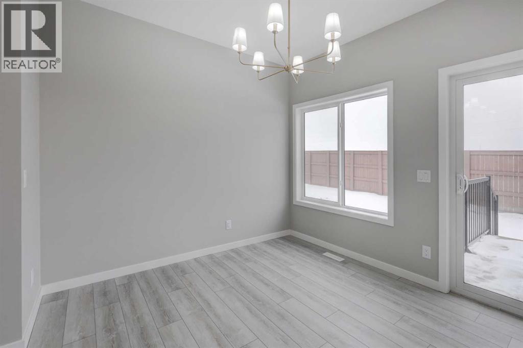 124 Carringvue Place NW, Calgary, Alberta  T3P 2G5 - Photo 7 - A2293009