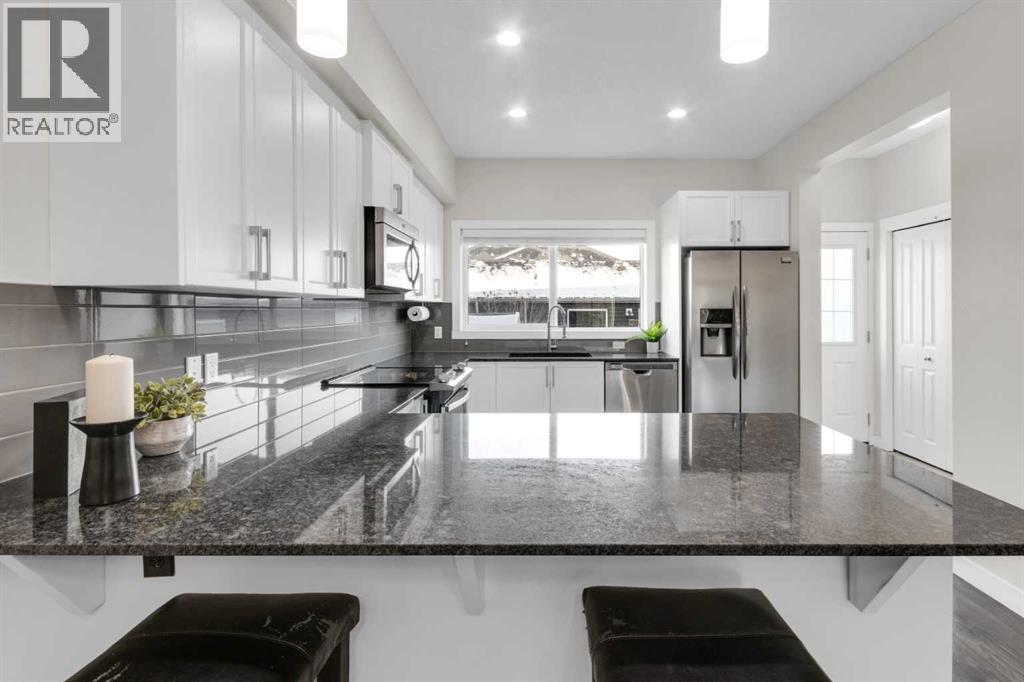 610 Hillcrest Road Sw, Airdrie, Alberta  T4B 4C8 - Photo 10 - A2292080