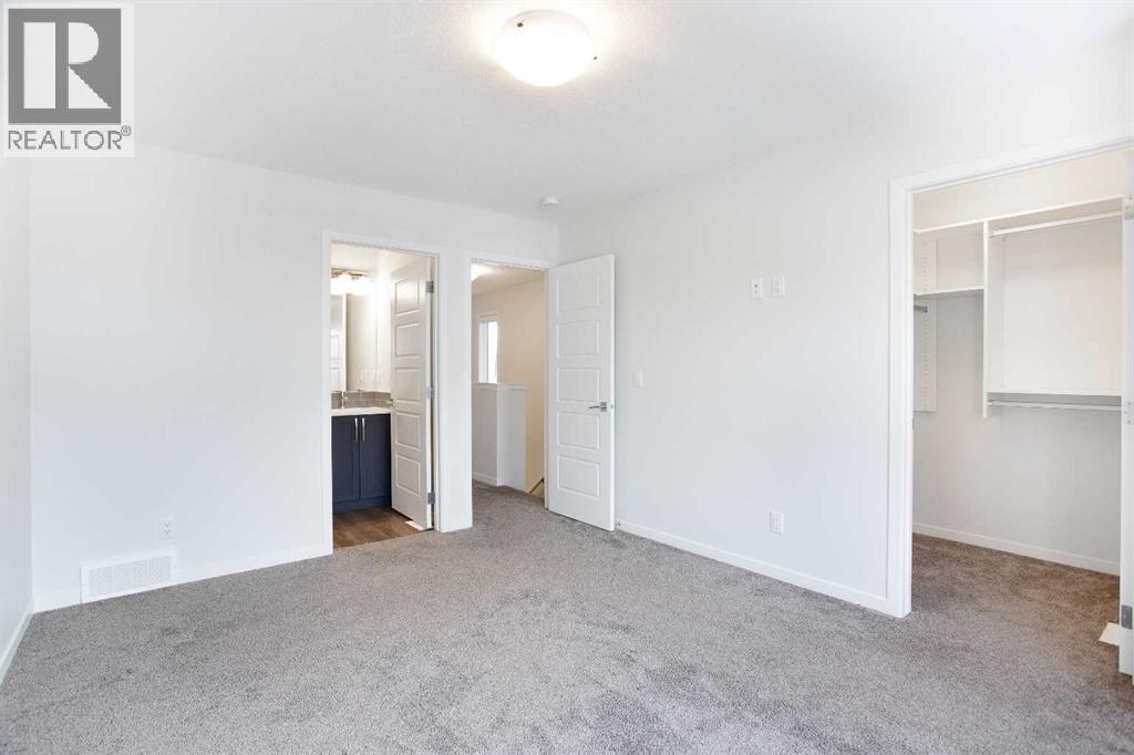 16 Creekstone Drive Sw, Calgary, Alberta  T2X 4Z5 - Photo 21 - A2281800